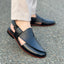 A black pure leather Kheri with a lace-up closure and a rubber sole