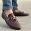 Brown woven loafers with tassels