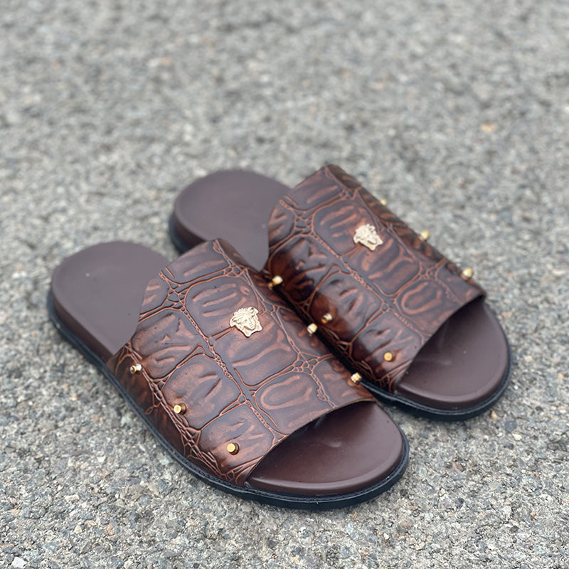 Brown crocodile embossed leather men's slides with gold stud detailing