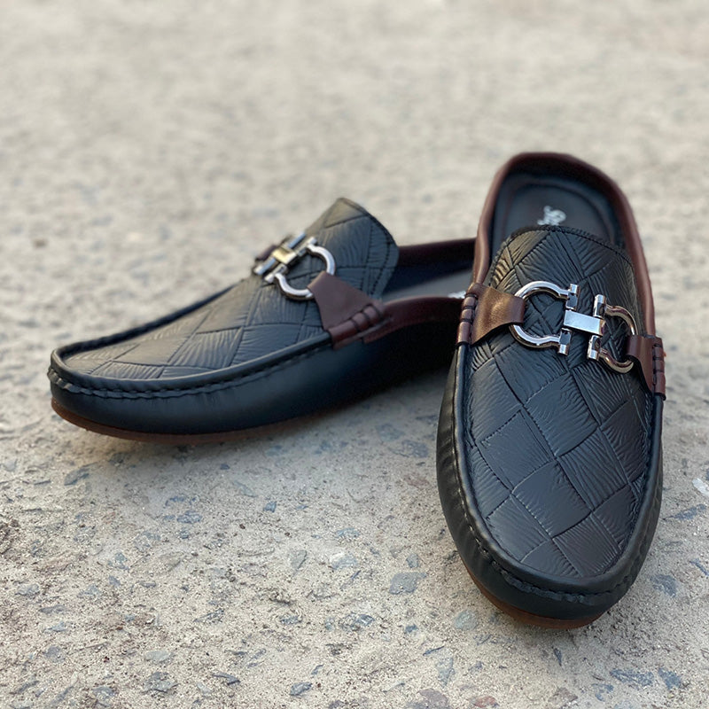 Men's black leather quilted mules with silver horsebit detail and brown accents