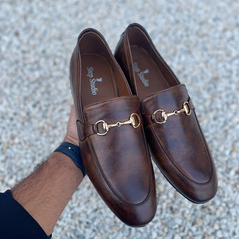 Handmade brown leather men's loafers with gold bit detailing from Step Studio
