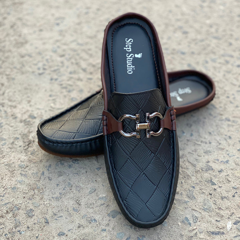 Black woven leather mules for men with silver buckle detail and brown trim